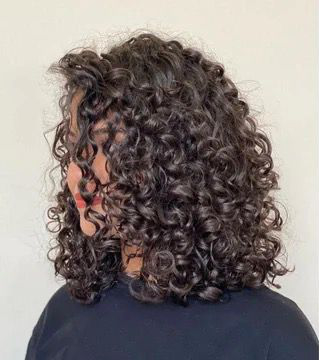A lady's hair after a perm from us